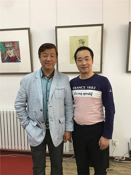 安徽省国画院副院长李毅与浦君创始人胡桂忠合影