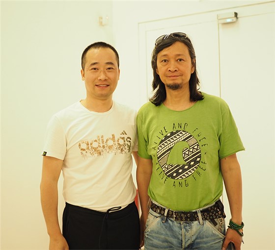 杭州美术家协会副主席何加林与浦君创始人胡桂忠合影