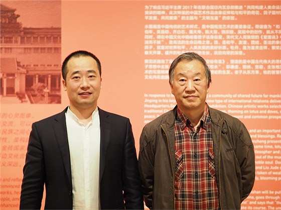 浦君艺术总经理胡桂忠与中国美术家协会会员戴顺智合影